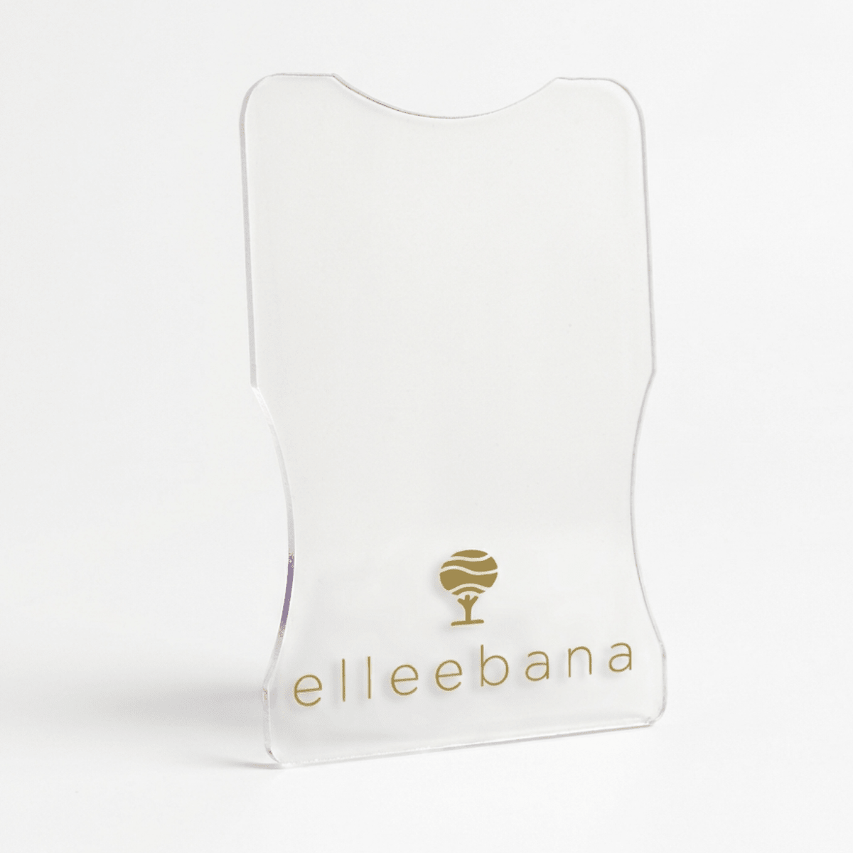 Close-up view of the smooth, curved edge of an Elleebana acrylic under-eye protective guard.