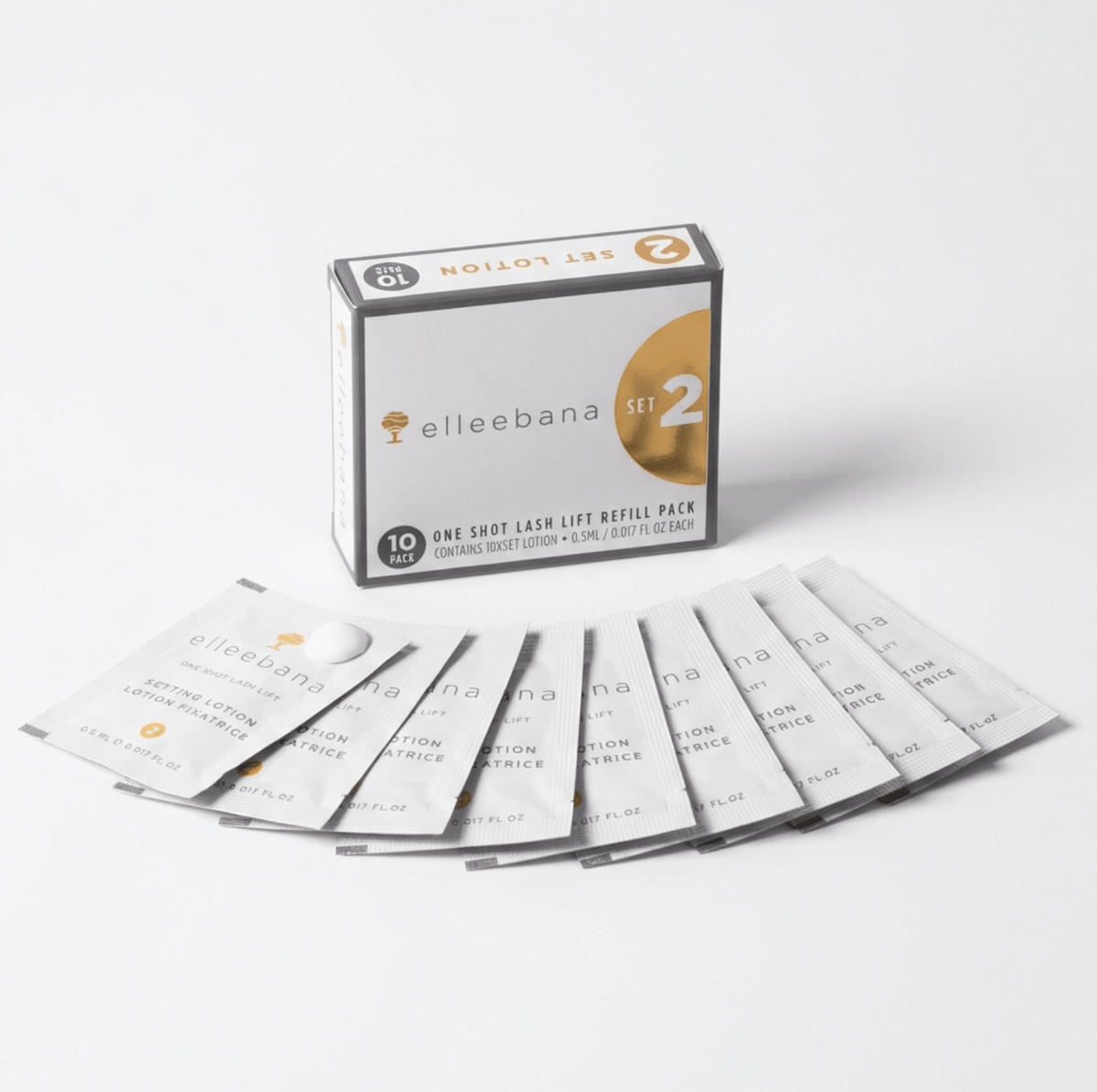 Close-up view of an individual Elleebana One Shot Lash Lift Step 2 setting lotion sachet designed to reform disulphide bonds.