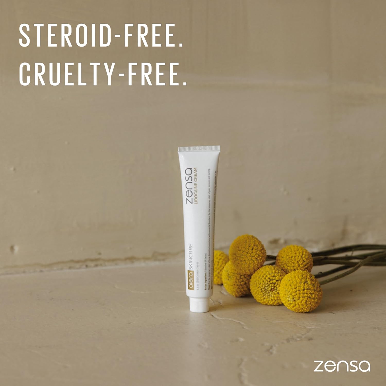 Professional Numbing Cream Zensa 30g tube on a neutral background with flowers, emphasizing steroid-free and cruelty-free benefits.