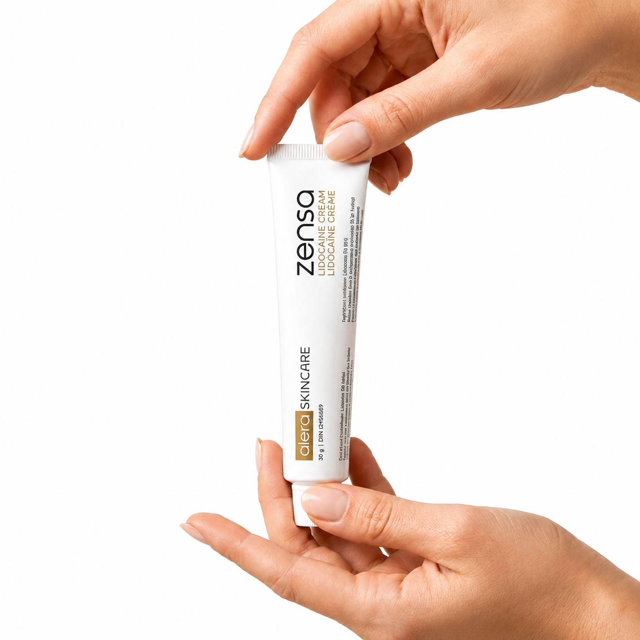 Professional Numbing Cream Zensa 30g with 5% Lidocaine, held in hands for cosmetic procedures.